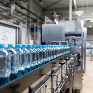 Water bottling line for processing and bottling pure spring water into canisters.